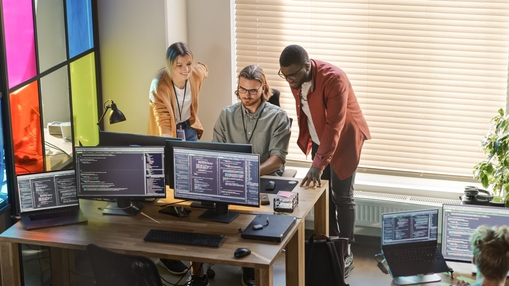 Three Coworkers Computer Code