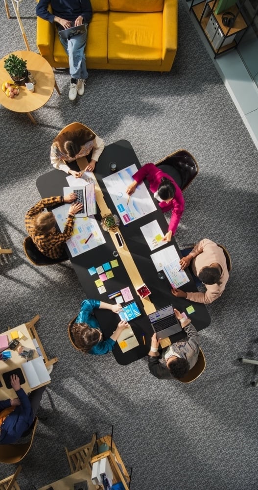 Team Meeting Aerial Colorful_Vertical