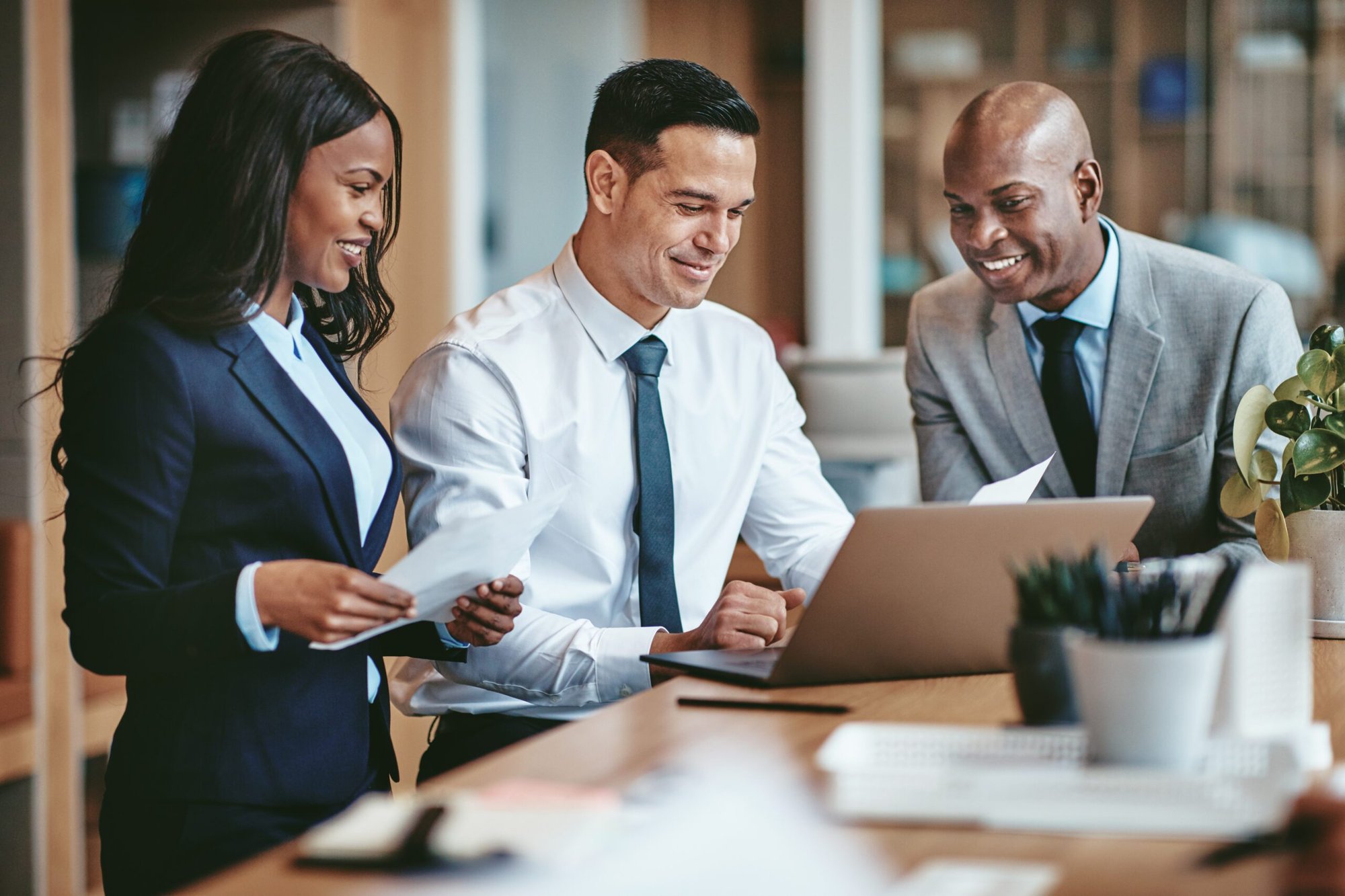 Three professionals working together